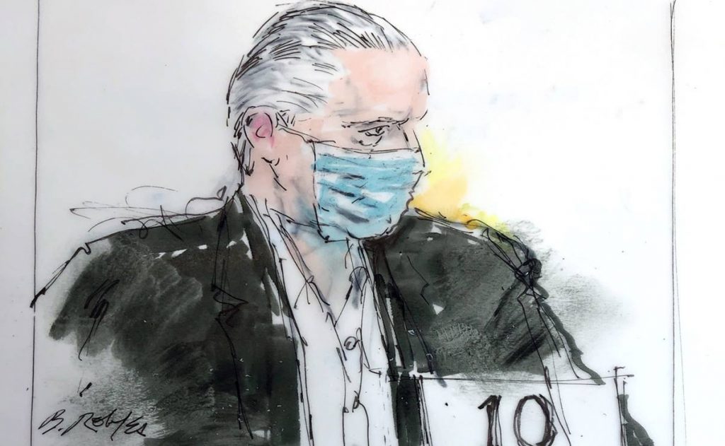 Salvador Cienfuegos se presentó con saco, camisa y cubrebocas a su audiencia en EU